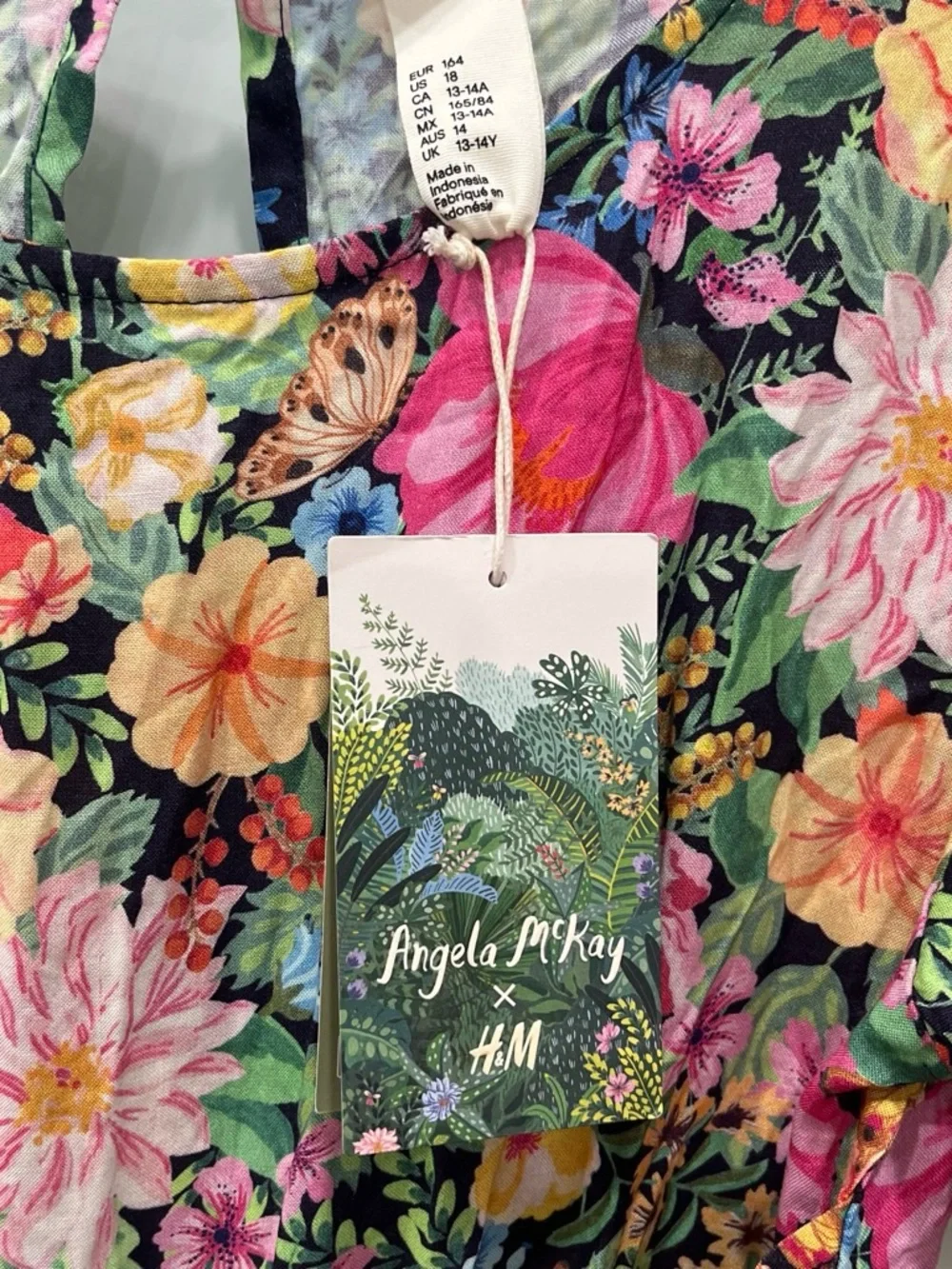 Angel McKay Multi-colored floral print jumpsuit with tie waist, Size 18